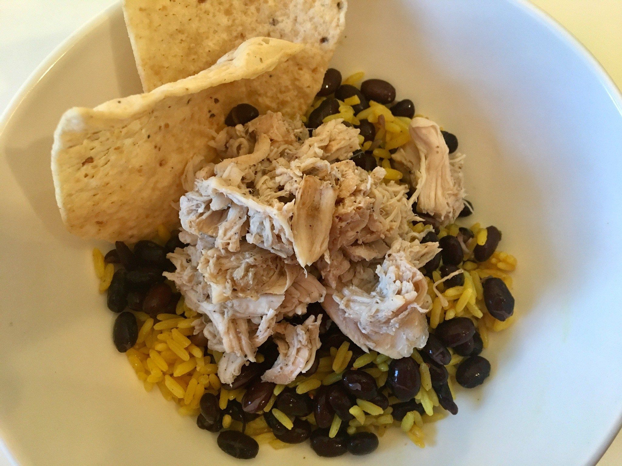 A easy crockpot recipe for Mojo Chicken with Beans & Rice!