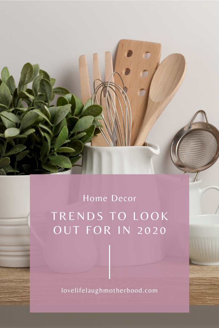 succulents and wooden utensils on a counter